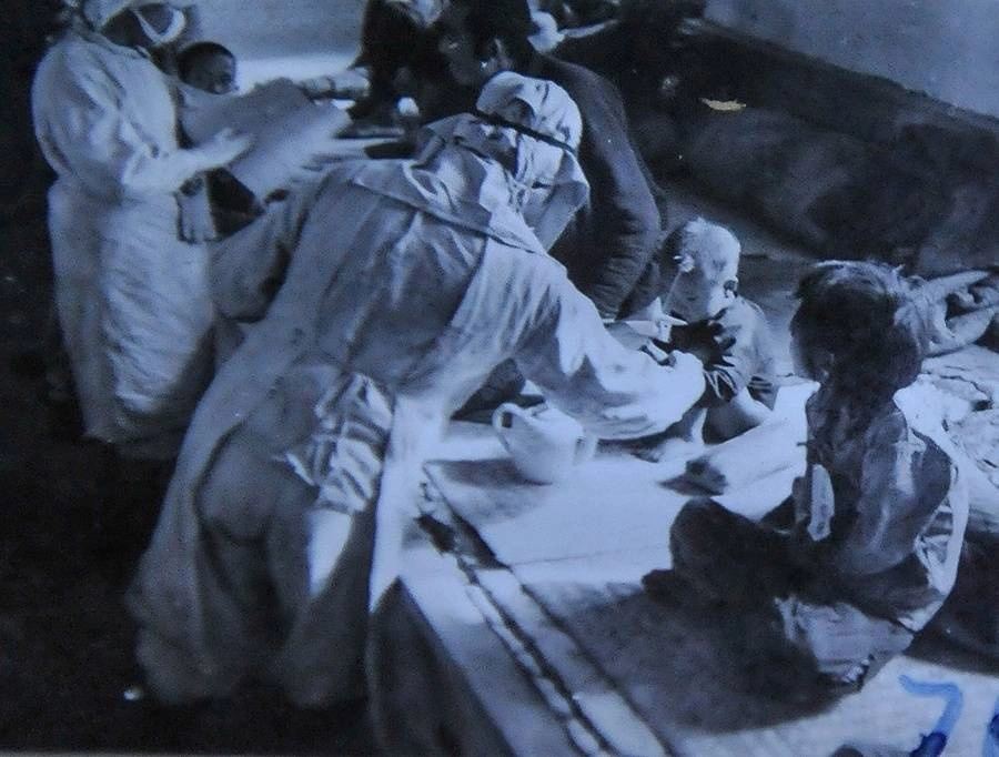 Unit 731 researchers conduct bacteriological experiments with captive child subjects
